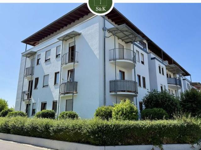 Grün gelegen und gut angebunden – Gepflegte 2 Zimmer Wohnung mit Balkon und Tiefgaragenstellplatz