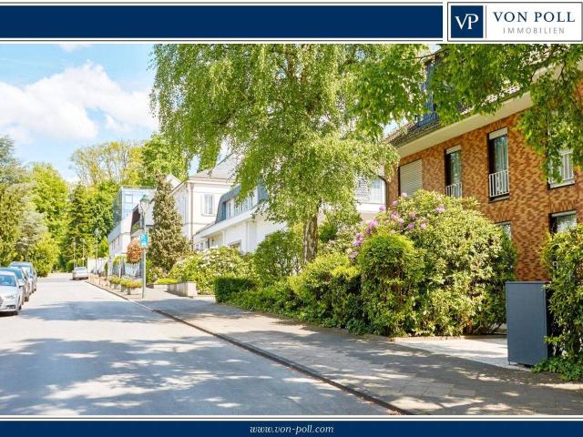Grüne Oase in begehrter Lage Terrassenwohnung mit Traumgartenblick