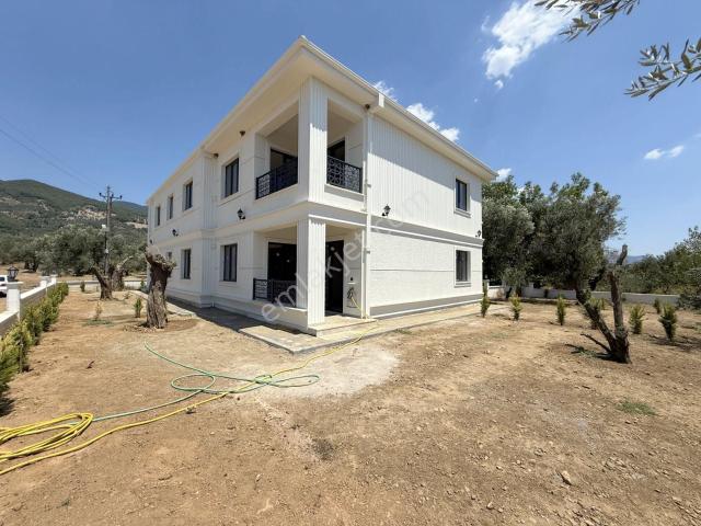Güç Gayrimenkul'den Güre'de Müstakil Tadında Geniş Bahçeli Sıfır Lüx Satılık 2+1 Daire