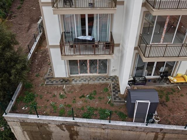 Güllükte Kiralık Deniz Manzaralı 2+1 Bahçe Katı