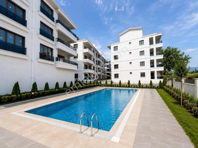 Gürsoy'dan İkizçayda Kapalı Otopark Yüzme Havuzlu Full Kredi 1+1