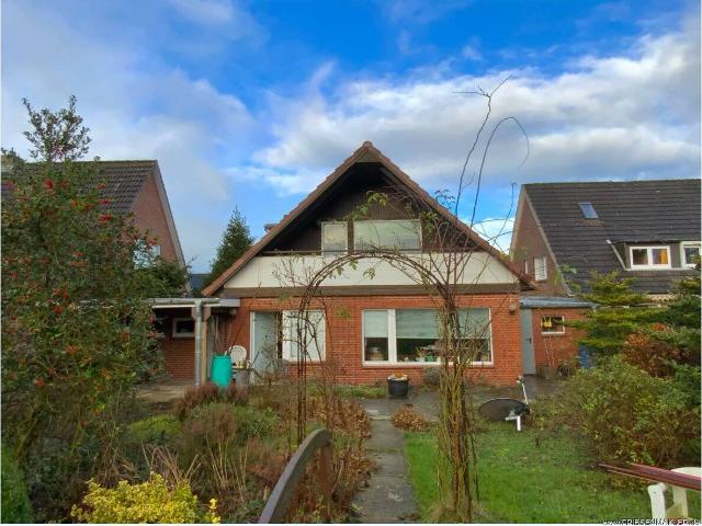 Gute Lage: Solides Einfamilienhaus mit Anbau auf reizvollem Südgrundstück m Garage und Nebengebäude