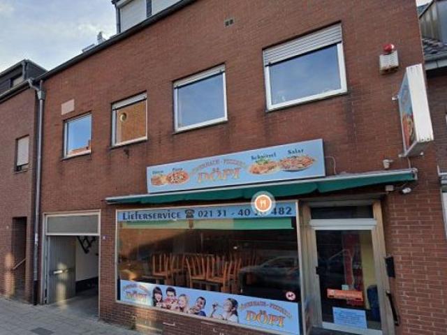 Gute Rendite! MFH mit vier Wohnungen und zwei Gewerbeeinheiten Beste Lage