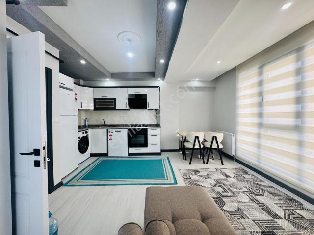 Güven'den Hastane Yanında Full Sıfır Eşyalı Kiralık 1+1 Daire