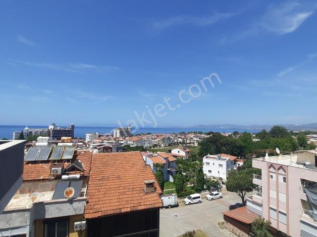 Güzelçamlı Merkezde Deniz Manzaralı Kiralık 1+1 Çatı Katı