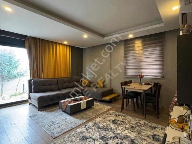 Güzeloba'da Özel Bahçeli Eşyalı Kiralık 1+1 Daire