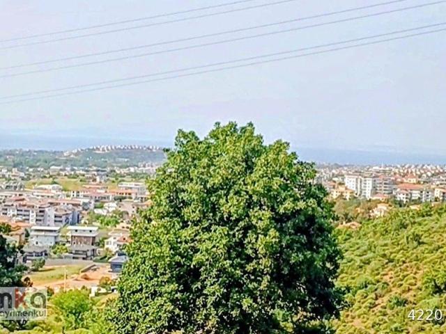 Güzelbahçede kapanmaz deniz manzaralı villa imarlı arsa