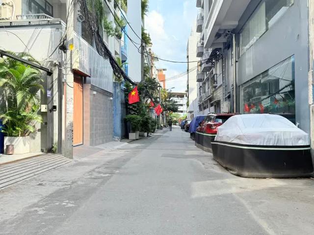 Hẻm nhựa 10m, 86m2 TÀI LỘC, kết cấu 5 tấm, có thang máy, giếng trời, View sân thượng ngắm máy