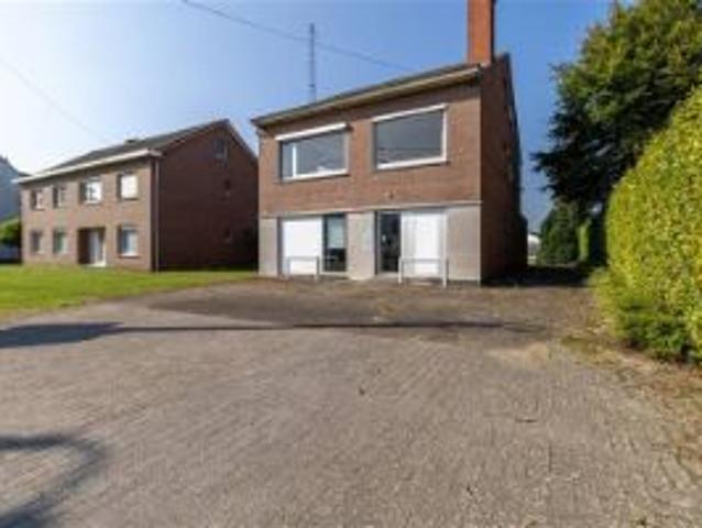 Handelswoning met duplex appartement in Mol Rauw