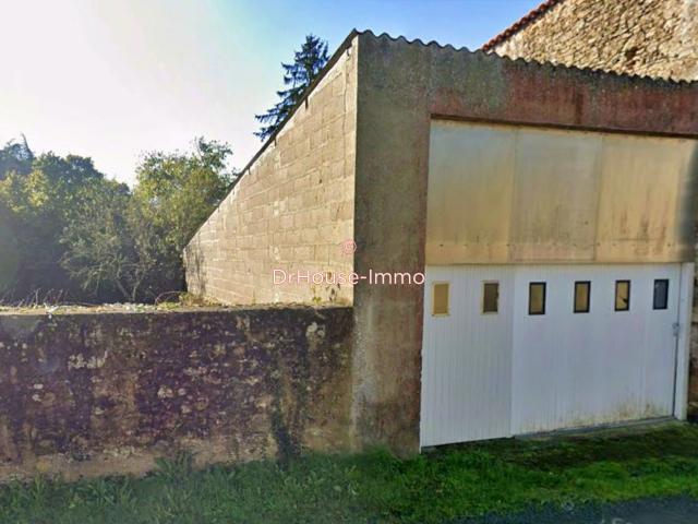hangar à usage de garage, cave et stockage sur terrain de 65m²