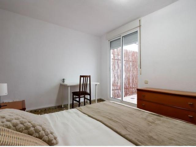 Habitación #4 con patio privado
