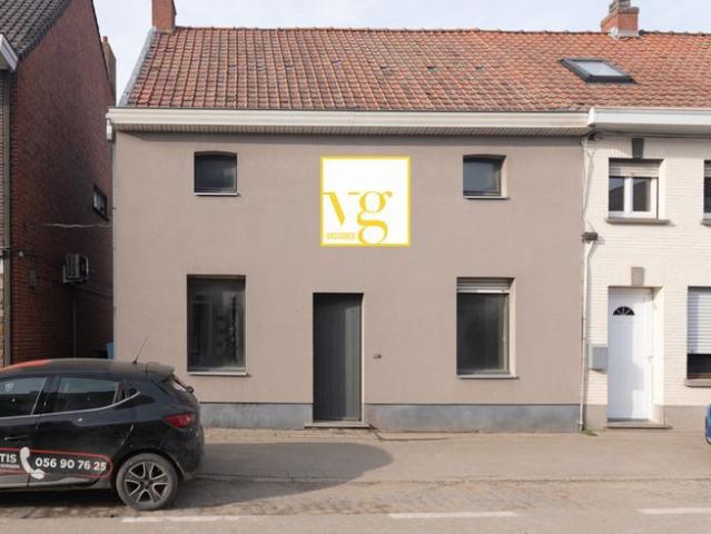 Halfopen woning met terras