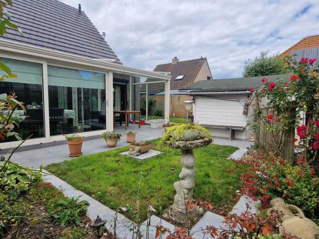 Halfopen bebouwing met garage te Lombardsijde