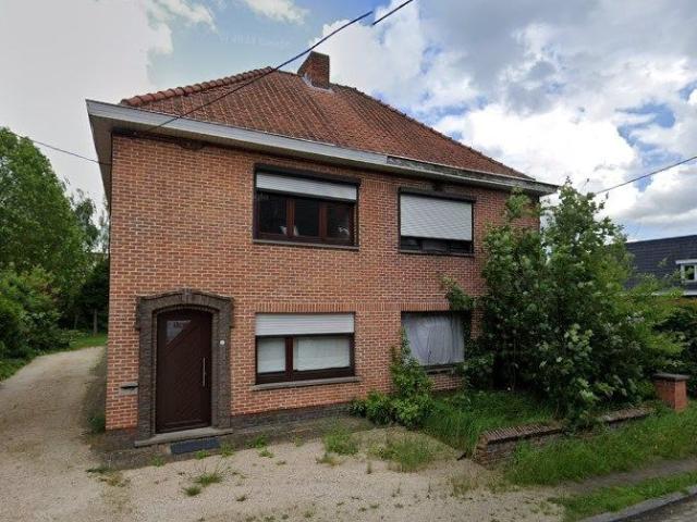 Halfopen bebouwing met tuin, carport en drie slaapkamers in Eksaarde
