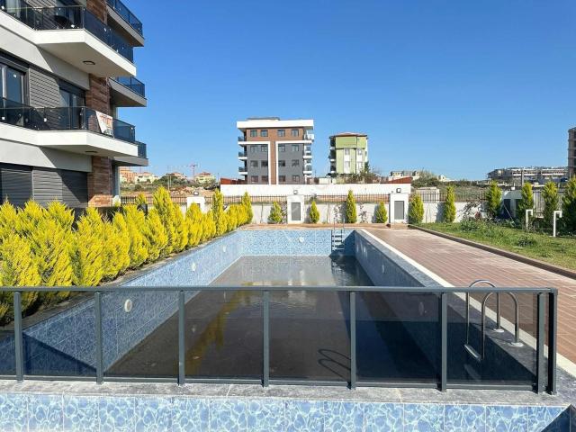 Havuz Cephe | Ara Kat Eşyalı Kiralık 1+1