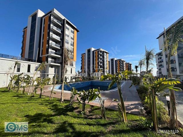 HAVUZLU KAPALI OTOPARKLI SİTE İÇİNDE GENİŞ VE LÜKS 1+1