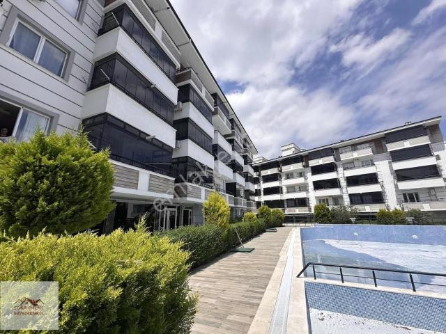 Havuzlu Site İçerisinde Çocuk Oyun Parklı 1+1 Satılık Daire