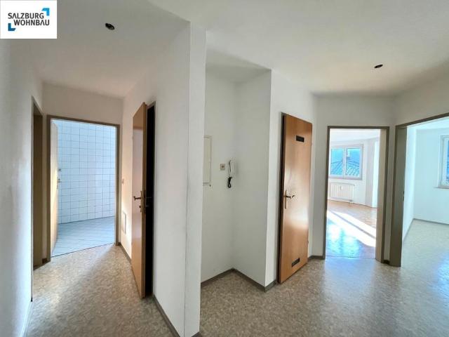 HEIMELIG IN ST. JOHANN! Sonnige, große, geförderte 2 Zimmerwohnung in St. Johann mit Balkon und Tiefgaragenplatz! Hohe Wohnbeihilfe möglich