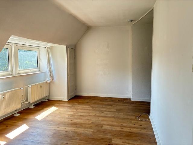Herrliche Dachgeschosswohnung mit Balkon