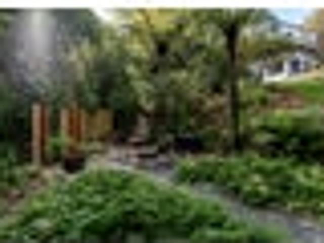 Hidden Away in a Peaceful Normandale Setting
