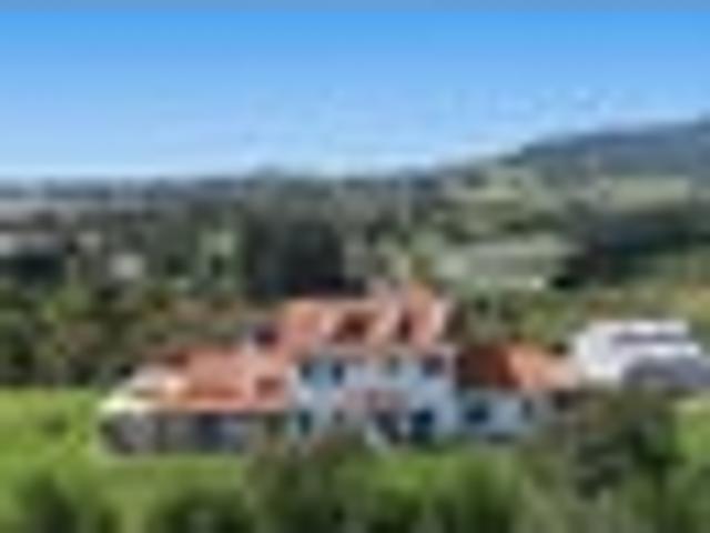 Hill top retreat with views and true scale