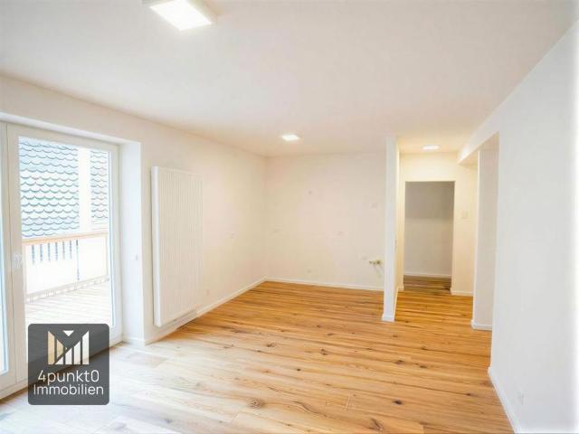 Hochwertig saniert: 4 Zimmer Maisonette, ca. 114 m², Balkon, 2 Bäder, Eichenholzböden