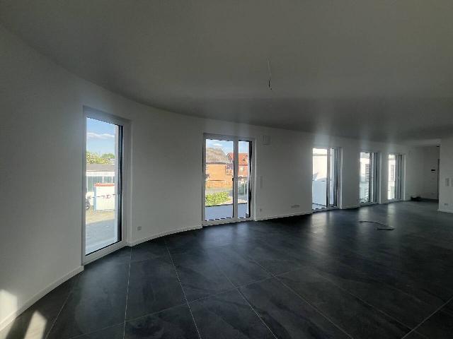 Hochwertige und energieeffiziente Obergeschosswohnung mit Balkon, Aufzug und Tiefgarage