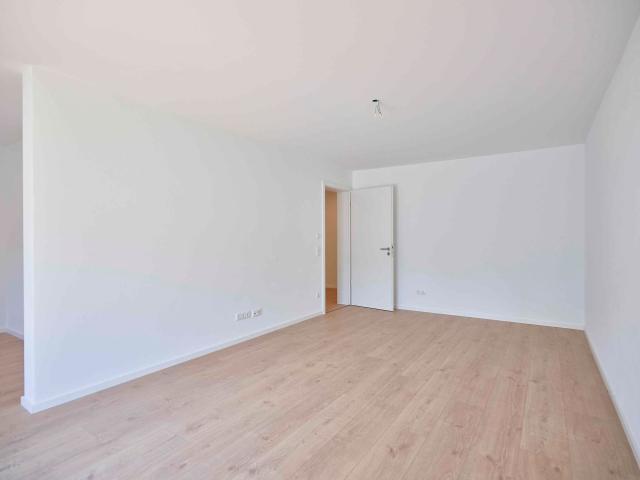 Hochwertige Eigentumswohnung mit Terrasse und Privatgartenanteil | WHG 9 Haus C