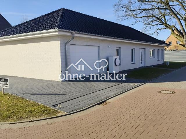 Hochwertiger und moderner Neubau Walmdachbungalow mit Photovoltaikanlage inklusive Speicher