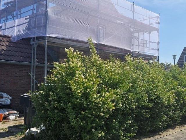 hoekwoning met zeer ruime tuin