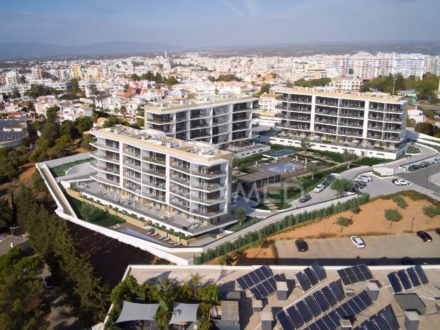 Horus Residence Apartamento T2 com 137m2 de área bruta e garagem Box 2 carros Portimão