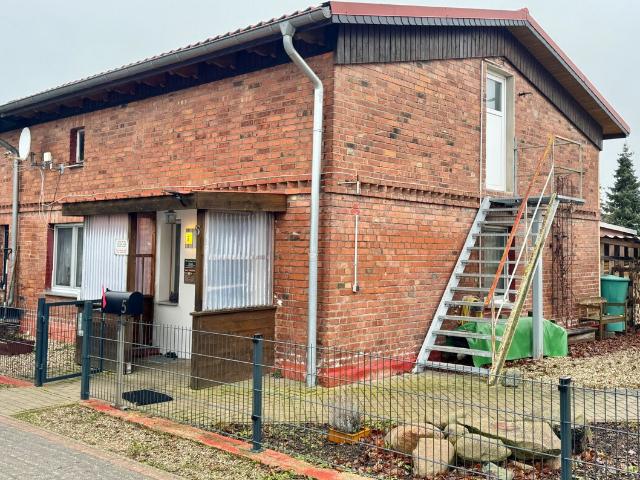 HORN IMMOBILIEN + Reihenendhaus mit Carport und Grundstück, ruhige Lage