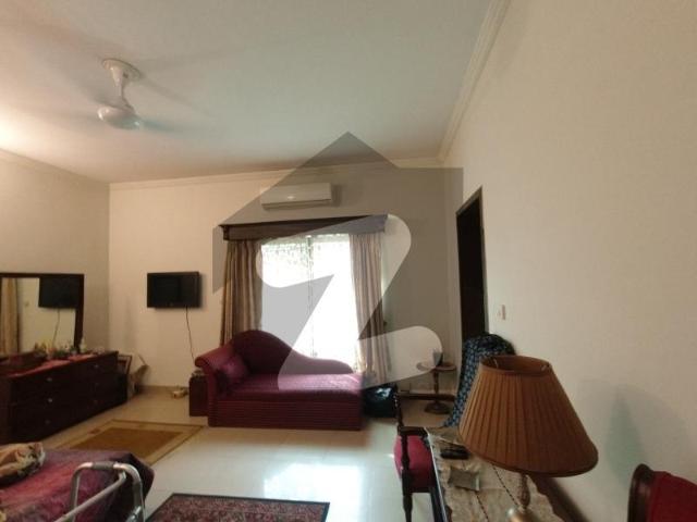 House With Extra Lawn On Backside Is Available For Sale In Askari 12