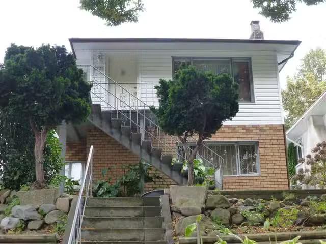 House for sale in Vancouver, Vancouver East, 2725 E Broadway.