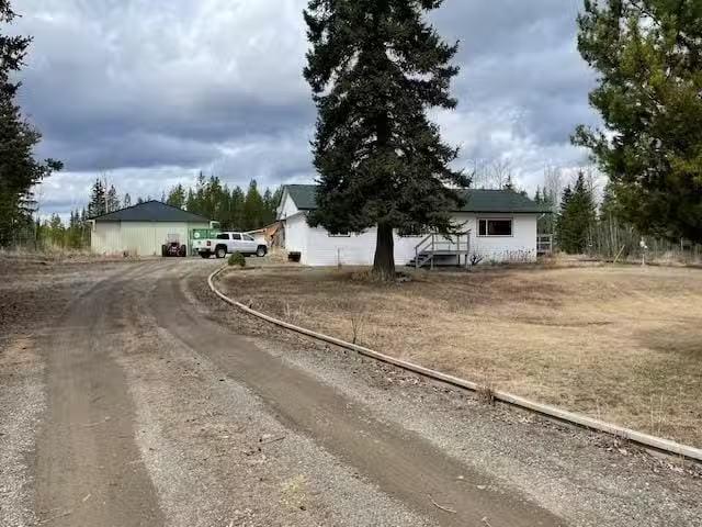 House for sale in Lone Butte, 100 Mile House, 7008 Holmes Road.