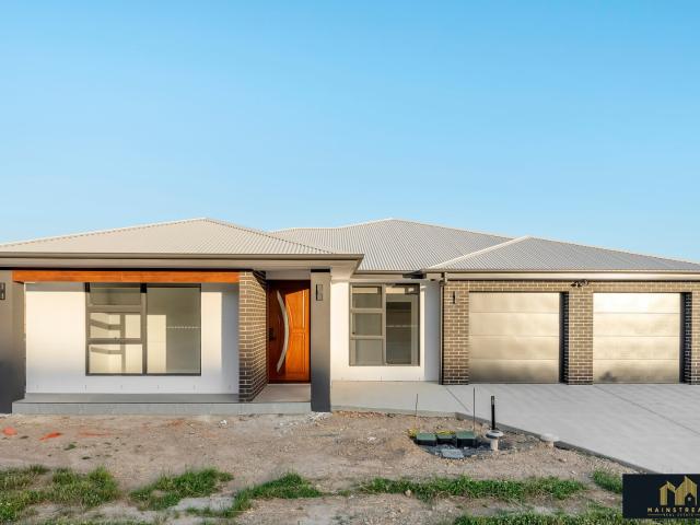 house for rent at 1/54 Pattie Menzies Way, Jacka ACT 2914, Australia