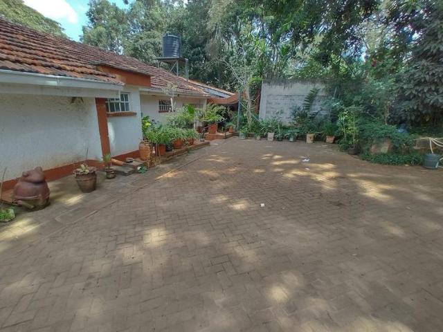 House, old muthaiga on 1.1 acre land. 4 bedrooms, 3 ensuite+ dsq+ 2 bedroom cottages
