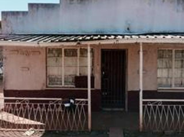 house on the market on big stand in.