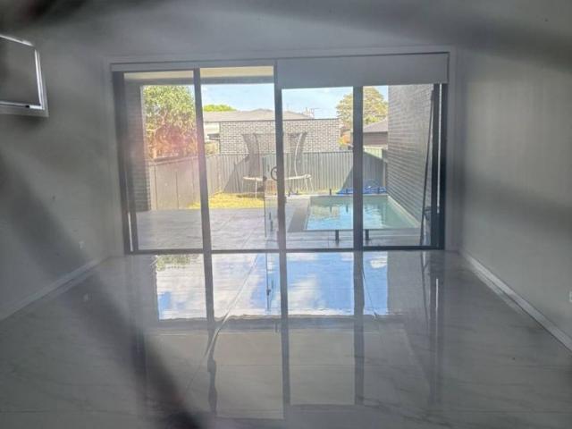 Huge near new porcelain tiled 6 bedroom mansion with pool