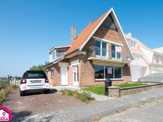 Huis Westende bad met zicht op de polders
