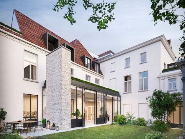 'Huys Boussart' Uniek appartement met binnentuin en gar.
