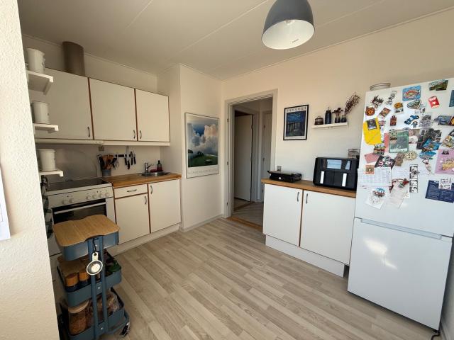Hyggelig 2 værelses lejlighed med lille altan