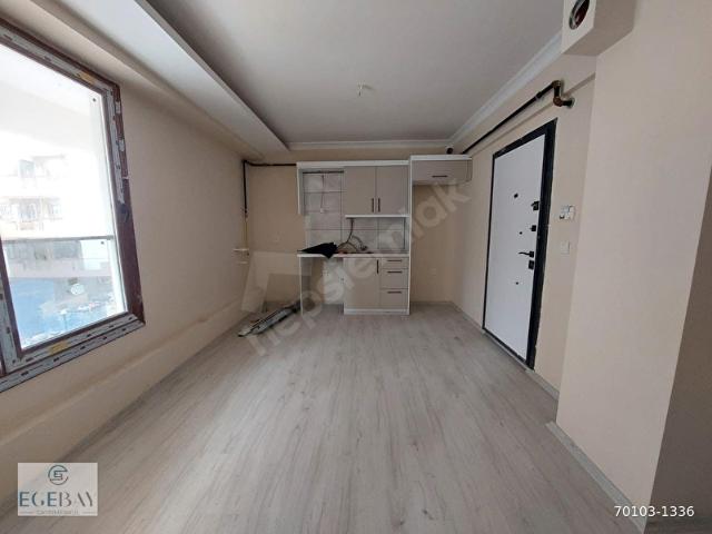 ŞİRİNYER LALELİ MH.DE TOPLU ULAŞIM ARAÇLARINA YAKIN KONUMDA 1+1 DAİRE