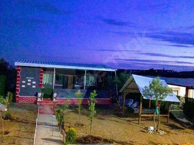 İZMİR TORBALI SAİPLER MAHALLESİ'NDE SATILIK BAHÇE VE 1+1 EŞYALI EV