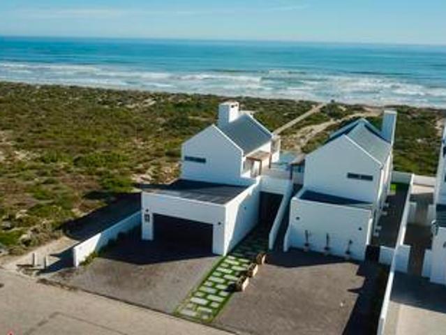 iconic beachfront residence with unr.