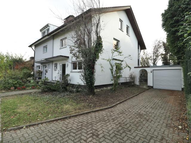 Ihr neues Zuhause in Wyhlen: Doppelhaushälfte mit großem Garten und Garage in sehr guter Lage!
