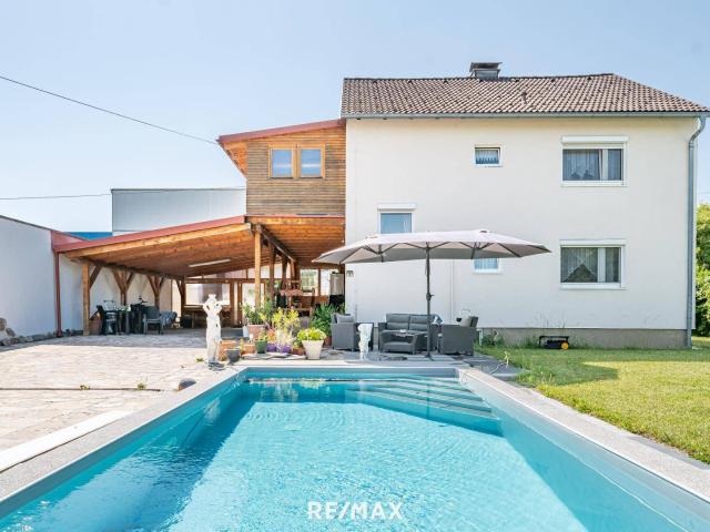 Ihre Lebenschance: Charmantes Zweifamilienhaus mit Pool & Gartenparadies!