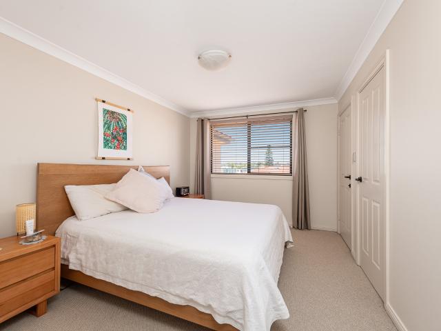 Immaculate double brick & concrete townhouse in premier boutique development