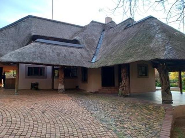 immaculate double storey thatch res.
