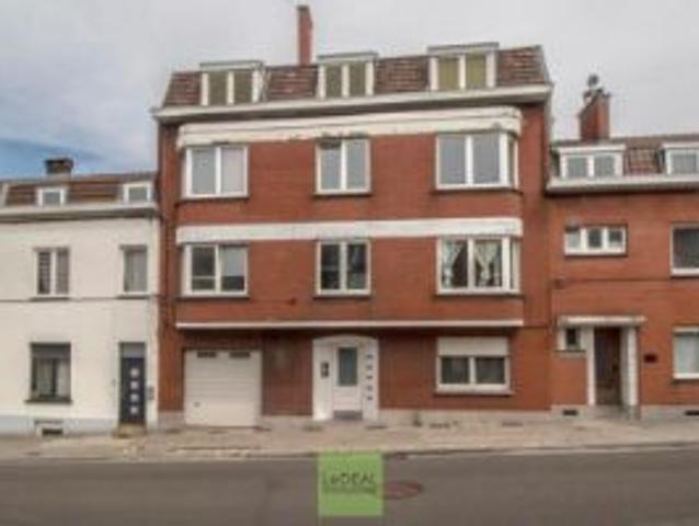 Immeuble 6 unités + garage en ordre